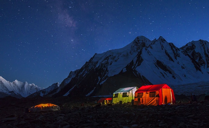 6. The porters’ tent at K2’s base camp is just a tarpaulin stretched over the stones, left, while the other tents belong to expedition members